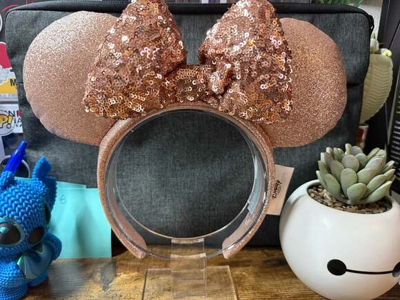 Disney Accessories - EUC Disney Parks Rose Gold Sequined Bow Ear Headband